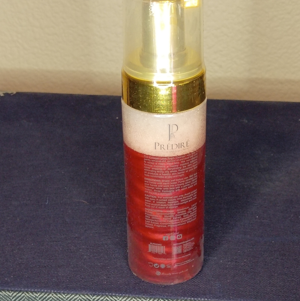 Predire Red and Gold Skincare Bottle